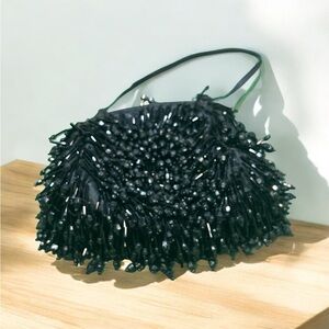 Roaring 20’s Shaggy beaded Black Handbag with kiss lock closure.